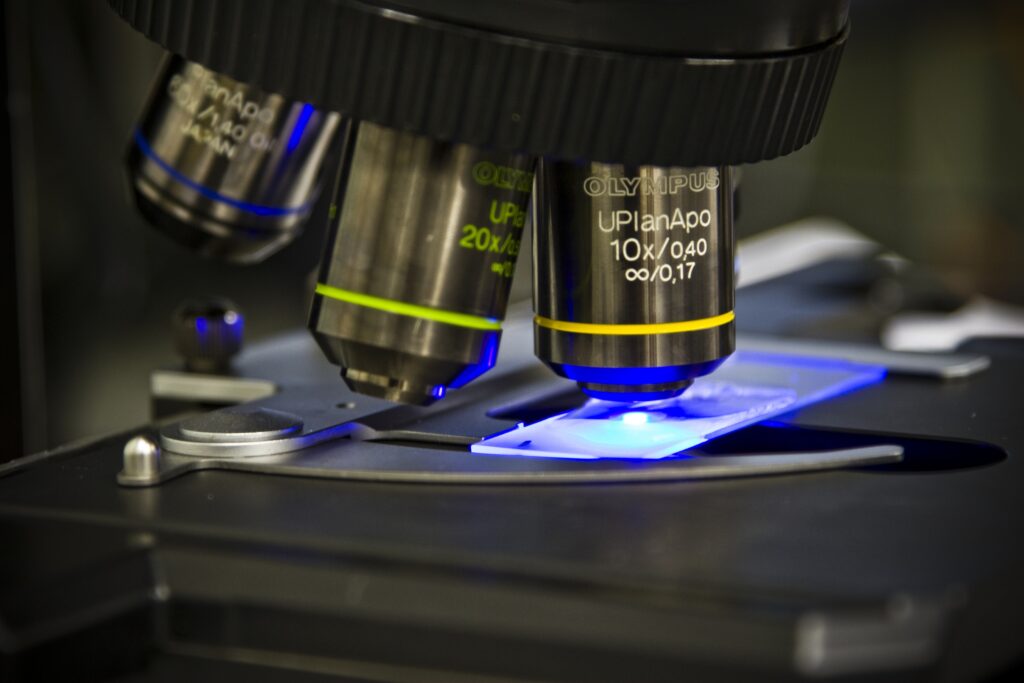 Using an Olympus Microscope to examine slides.
Source: Morgan Brown via CSIRO